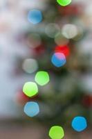 Blurry Christmas lights. Beautiful bokeh. Christmas and new year. Background for a greeting card or advertising banner. photo