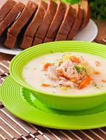 Finnish creamy soup with salmon photo