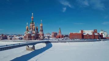 Aerial Footage View to the Blessed Virgin Mary Church on the Republic Square from the Bruges Embankment, Mari El Republic, Russia video