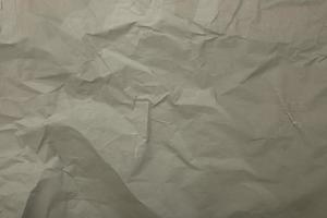 Gray paper crumpled background photo