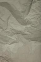 Gray paper crumpled background photo