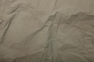 Gray paper crumpled background photo