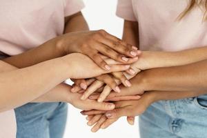 Different ethnicity female hands. Multicultural diversity and friendship. photo