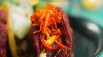 Mexican Flag TACOS. It forms the shape of the Mexican flag on a flat vessel video