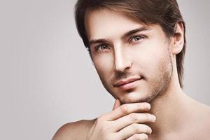 Young handsome man with a stubble beard photo