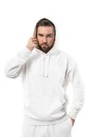 Handsome man wearing blank white hoodie on white background photo