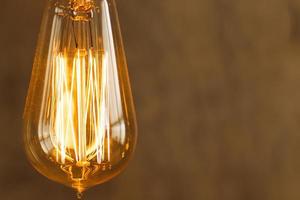 Close up of vintage filament light bulb photo