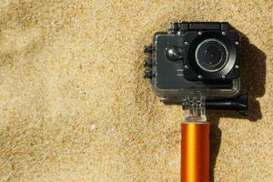 cámara de acción en la playa foto