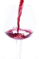 wine poured into a glass photo