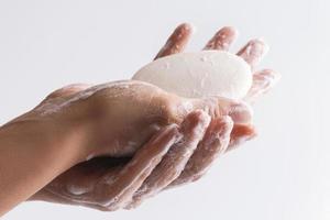 Close-up of female hands with a soap photo
