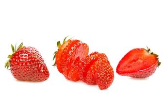 Fresh ripe sliced strawberry on white background photo