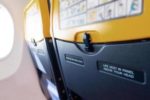 Close up view of seats inside an airplane photo