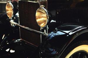 Front part of the retro car and headlight photo