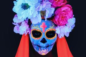 Creative image of Sugar Skull. Neon makeup. photo