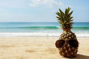 Pineapple fruit and sunglasses photo
