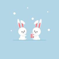 vector ilustración de invierno dos conejos sentados con un regalo
