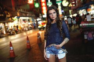 Sexy and beautiful model is posing in the Chinatown photo