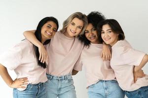 Multicultural diversity and friendship. Group of different ethnicity women. photo