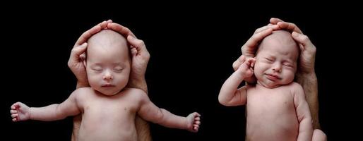 Two little baby twins with a different tempers photo