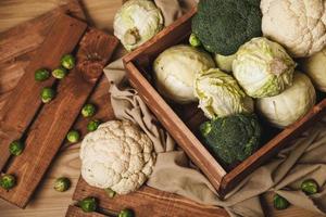 A lot of different cabbages in the wooden box photo