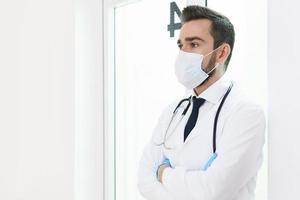 Young and confident doctor in the hospital photo