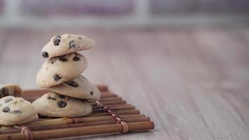 Chocolate chip cookies on table close up video