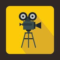 Old movie camera with reel icon, flat style vector