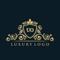 logotipo de la letra uo con escudo dorado de lujo. plantilla de vector de logotipo de elegancia.