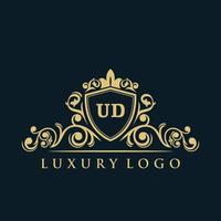 Letter UD logo with Luxury Gold Shield. Elegance logo vector template.