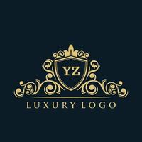 logotipo de la letra yz con escudo dorado de lujo. plantilla de vector de logotipo de elegancia.