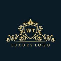 logotipo de letra wt con escudo de oro de lujo. plantilla de vector de logotipo de elegancia.