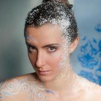 Portrait of young woman with art winter make up like Snow Queen photo