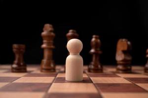 New business leader confrontation with king chess is a challenge for new business player, strategy and vision is key success. Concept of competition and leadership photo