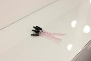 Black brushes for eyebrows and eyelashes. Brush set photo