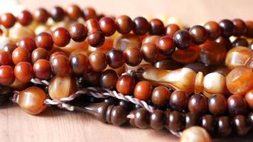 close up of muslim prayer breads isolated on table video