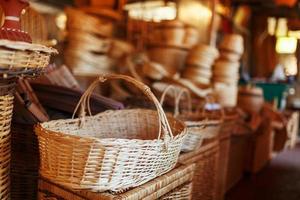 Handmade wicker baskets, items and souvenirs at the street craft market photo