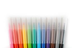 Multi-colored felt-tip pens, markers on a white isolated background photo