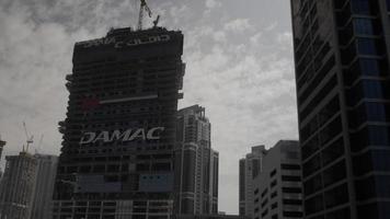 Driving By Buildings, Skyscrapers, City Of Dubai Through Car Window video