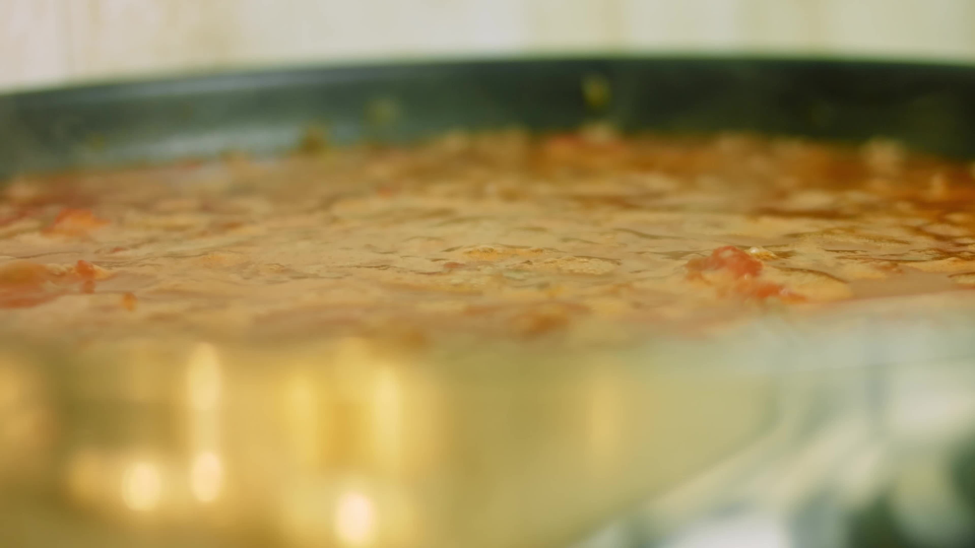 Mix all ingredients with a wooden spoon. Cook chili con carne, Mexican cuisine 14442075 Stock