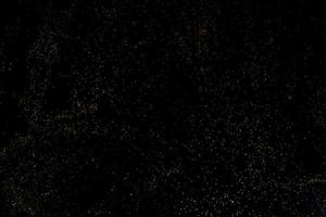 Dark texture with a sprinkling of gold. Backdrop with golden sparkle for overlay photo effect filters. fancy, luxury, themed backgrounds.