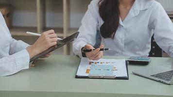 Businessman working with smart phone and laptop and digital tablet computer in office with digital marketing media in virtual icon video