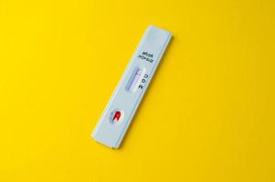 Negative test result by using rapid test for COVID-19, quick fast antibody point of care testing. Lab performing rapid diagnostic test for antibodies to detect presence of antigens COVID-19 disease photo