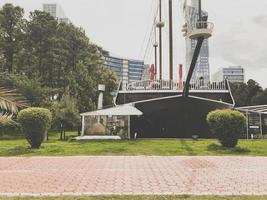 Unusual interesting restaurant in the form of an old sailing ship in the park in the middle of the city photo