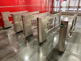 automatic entrance ticket gate of subway ,Entrance Gate Ticket Access Touch technology Subway Station with no people photo