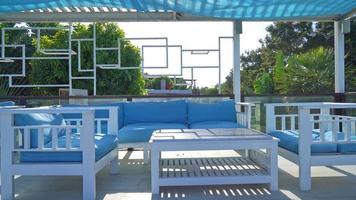 blue and white patio outdoor chair and table video