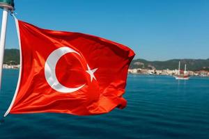 Flag of Turkey on a background of waving cotton texture. photo