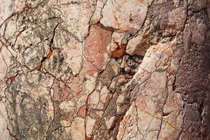 Pink marble with cracks, stone texture background, Full screen. photo