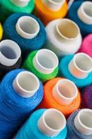 Colorful spools of sewing thread. Colored thread for sewing photo