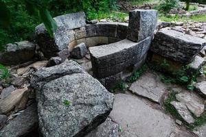 Ancient round ruined dolmen in the valley of the river Jean, Monument of archeology megalithic structure photo