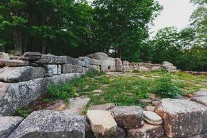 Ancient tiled dolmen in the valley of the river Jean. Monument of archeology megalithic structure photo